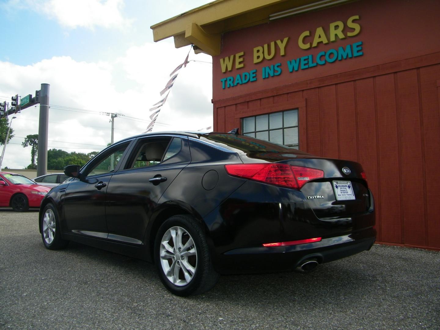 2012 Maroon /Black Kia Optima EX (5XXGN4A77CG) with an 2.4L L4 DOHC 16V engine, 6-Speed Automatic transmission, located at 4000 Bee Ridge Road, Sarasota, FL, 34233, (941) 926-0300, 27.298664, -82.489151 - Photo#2